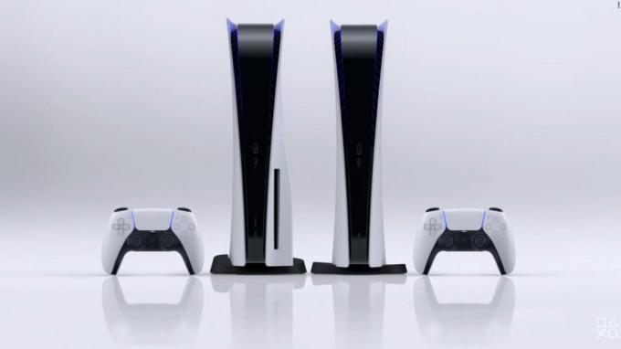 Dois consoles PlayStation 5 com controles Dual Shock. 